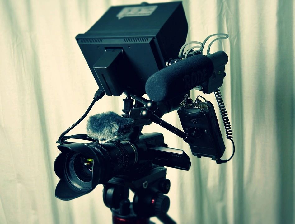 Professional video camera on tripod